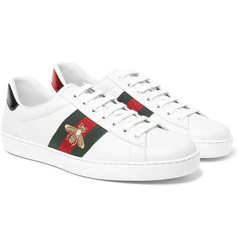 mens white gucci sneakers|Gucci men's ace leather sneakers.